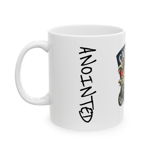 White mug with 'ANOINTED' text and a logo on a white background