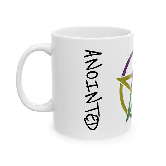 Side of the 11oz mug featuring the word “ANOINTED” in black, vertically aligned.