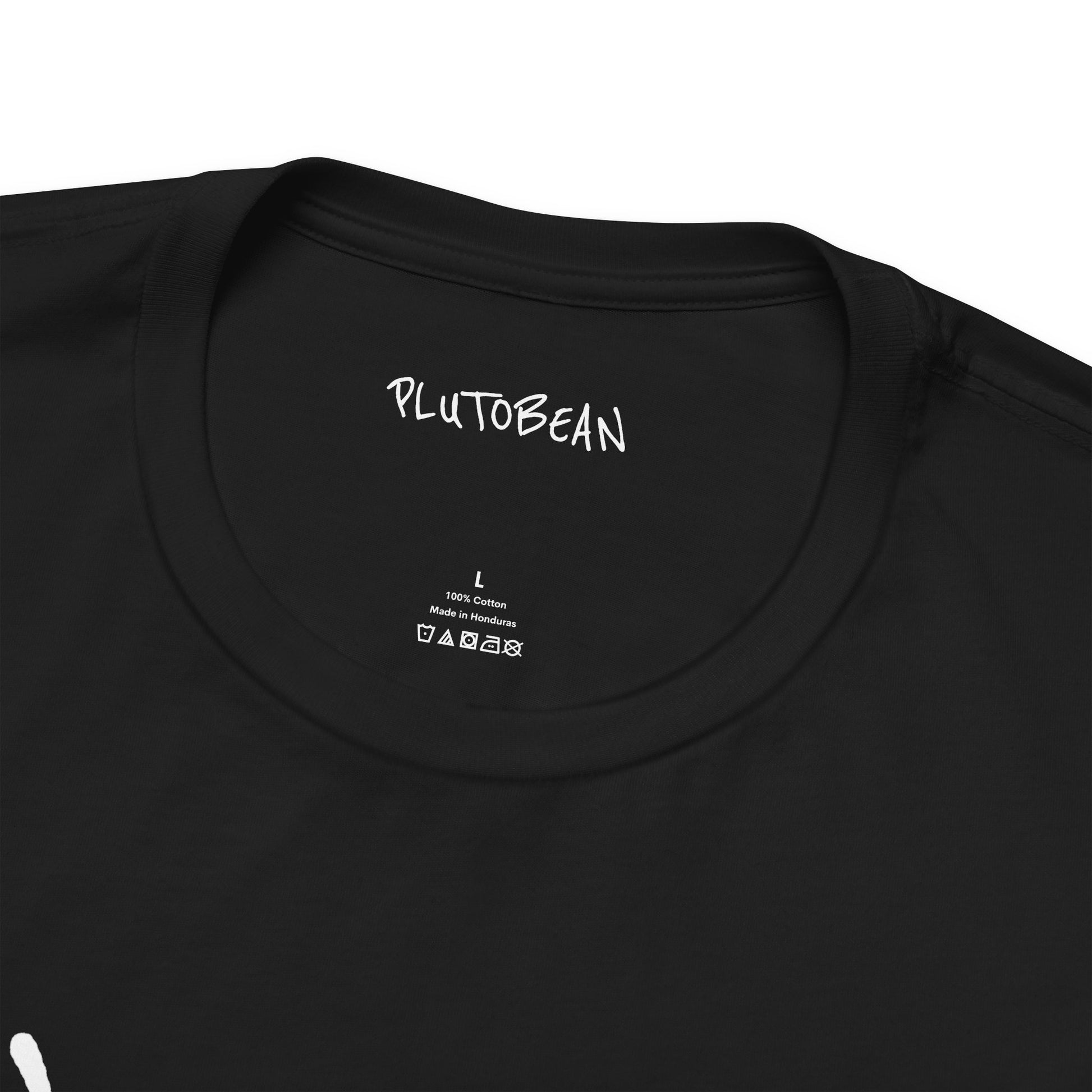 Close-up of neckline and inner tag on black ANOINTED tee with white print