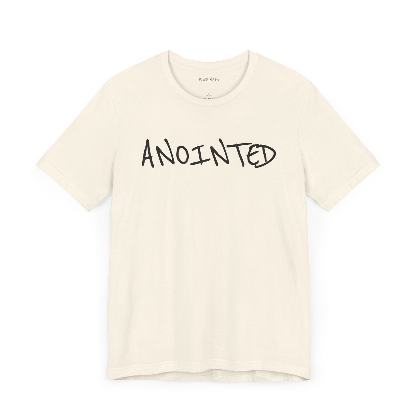 Natural t-shirt with handwritten black “ANOINTED” text across the chest