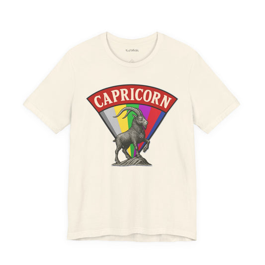Beige t-shirt with Capricorn zodiac sign graphic on a white background