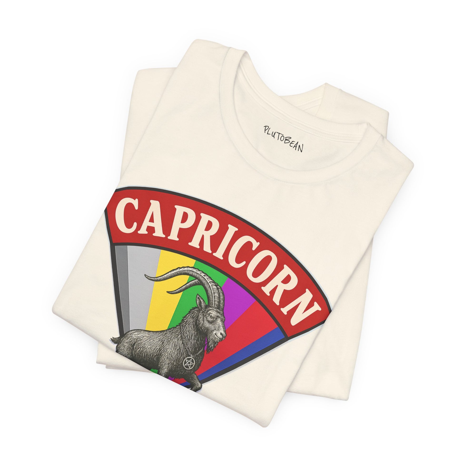 Folded t-shirt with Capricorn zodiac design on a white background