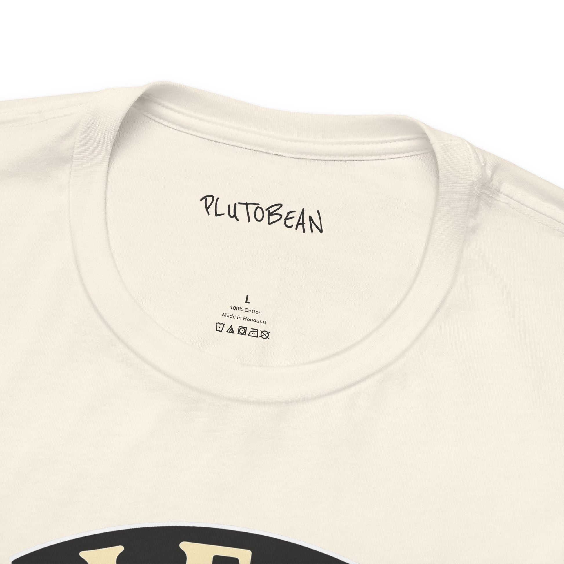 Close-up of a beige t-shirt with 'PLUTOBEAN' branding on the neckline.