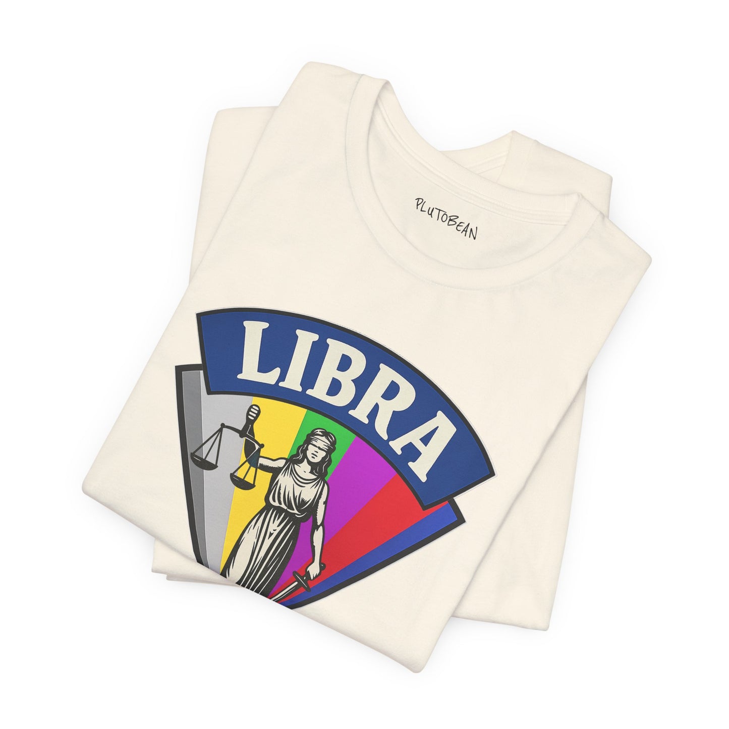 Folded t-shirt with Libra zodiac sign design on a white background