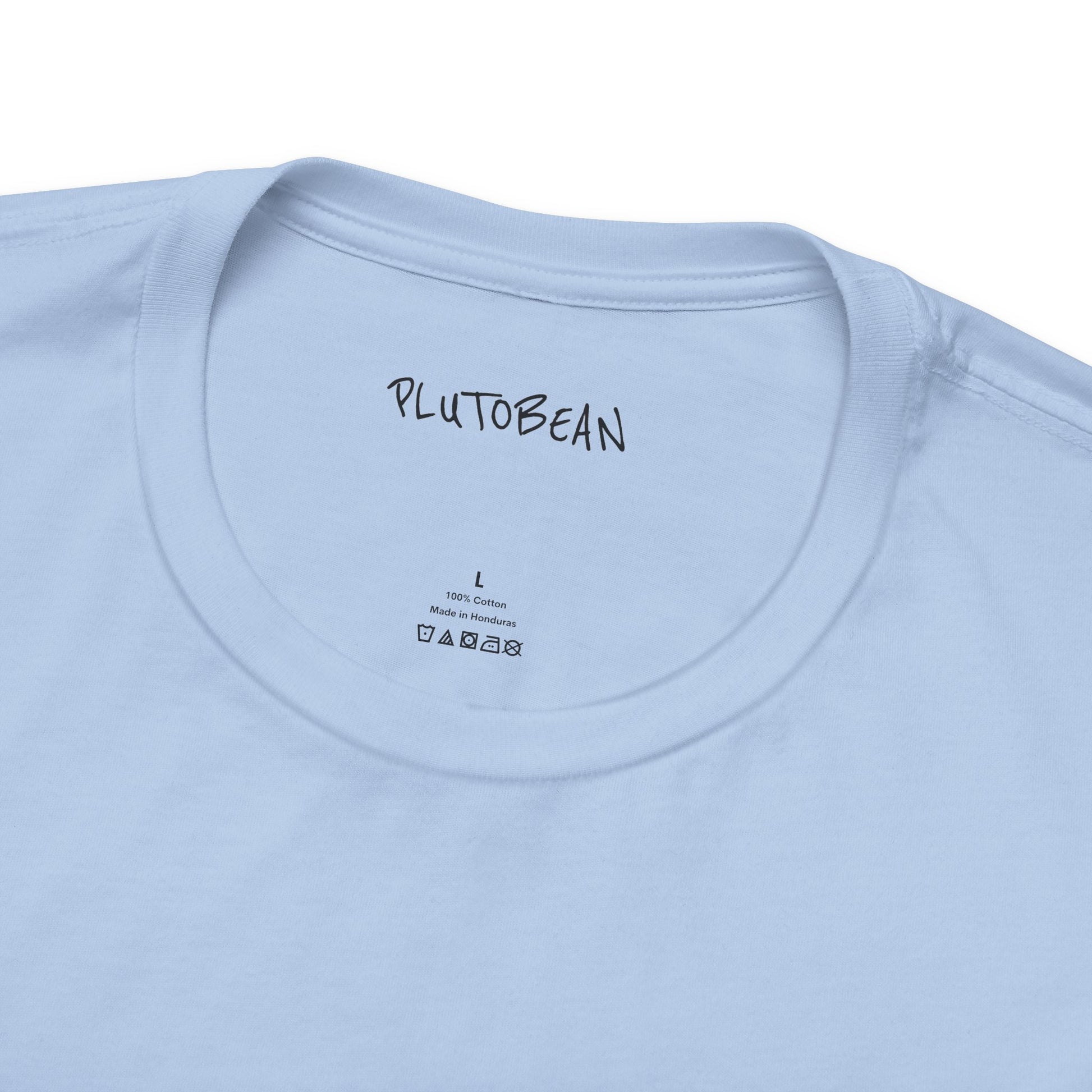 Close-up of neckline and tag on DIVINELY GUIDED baby blue tee with black lettering