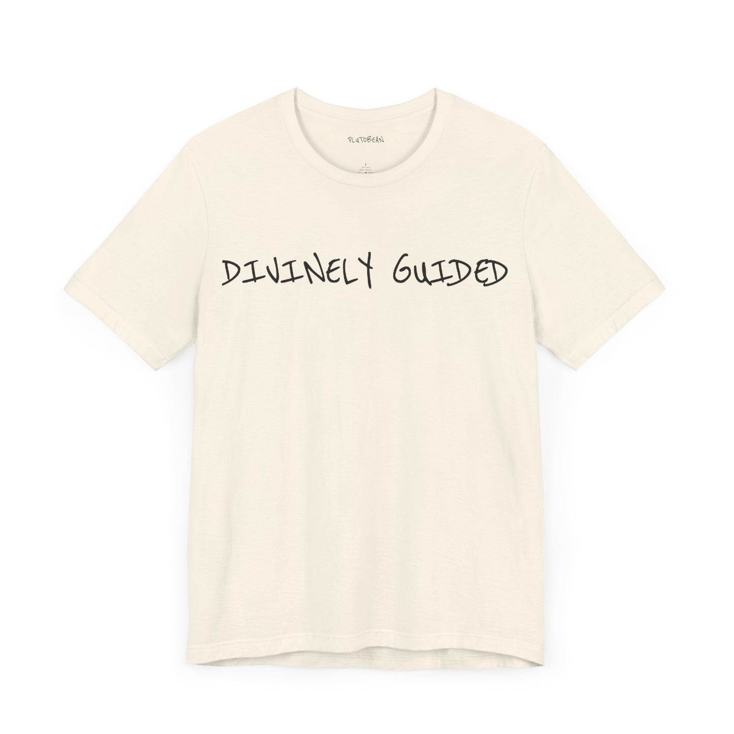 Natural t-shirt with handwritten black “DIVINELY GUIDED” text across the chest