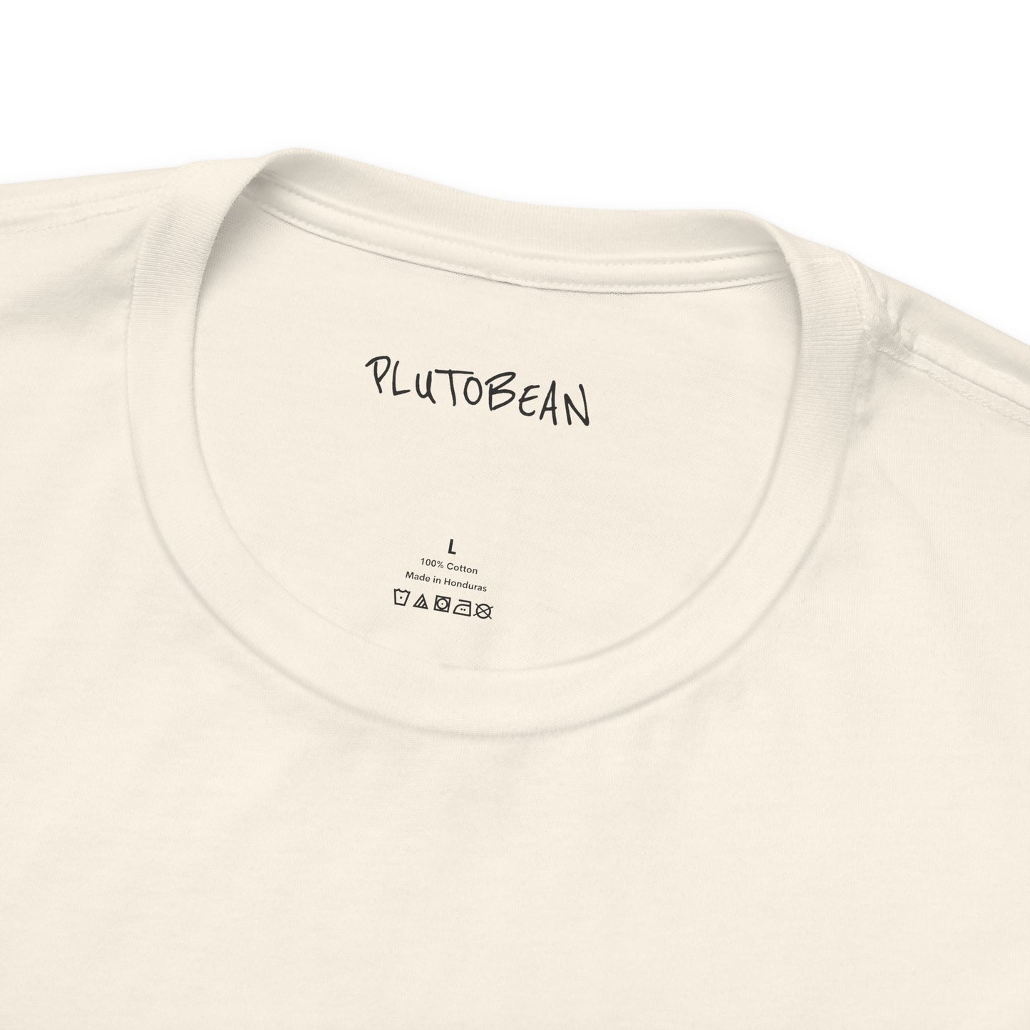 Close-up of collar and tag on DIVINELY GUIDED tee in natural with handwritten black text