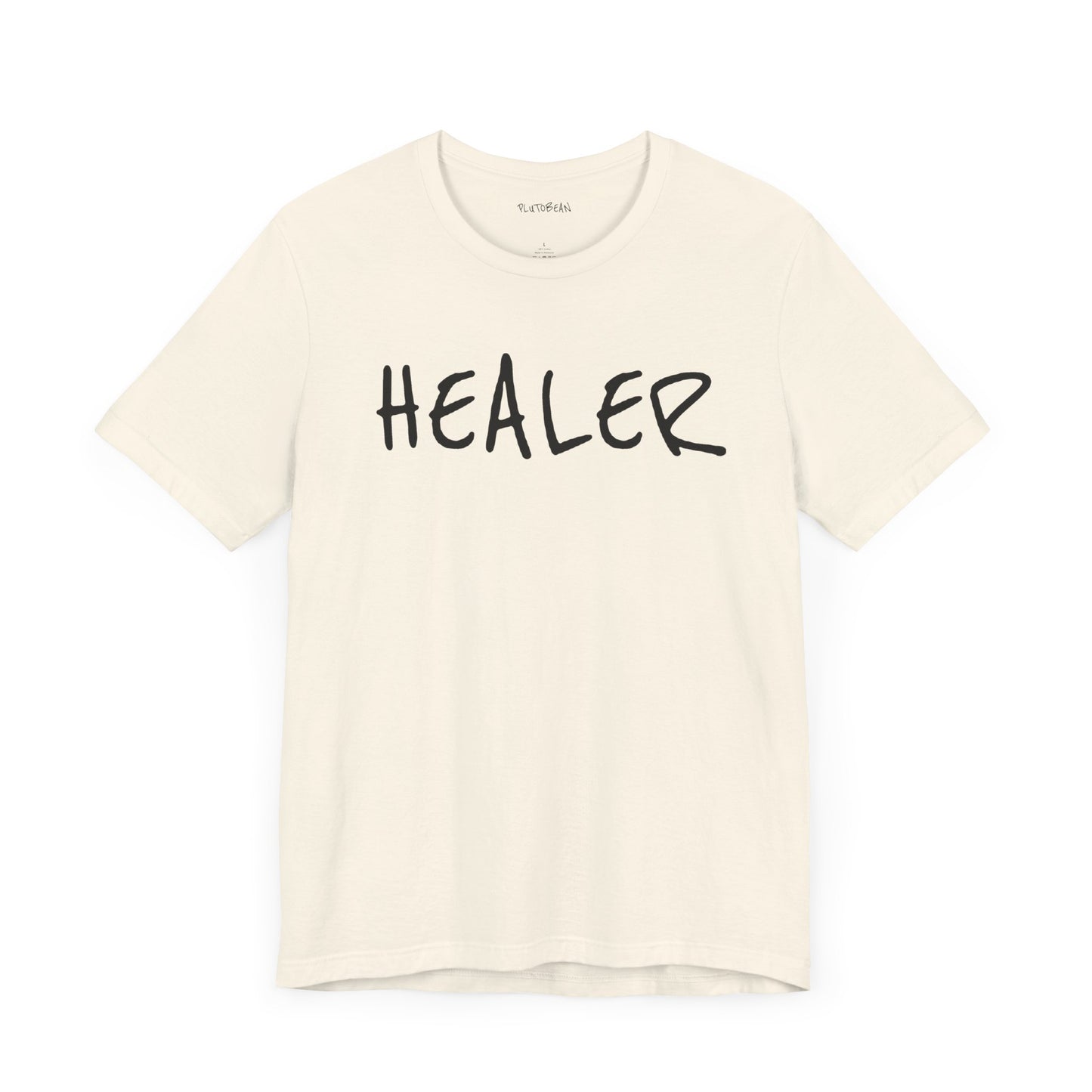 Natural t-shirt with handwritten black “HEALER” text across the chest