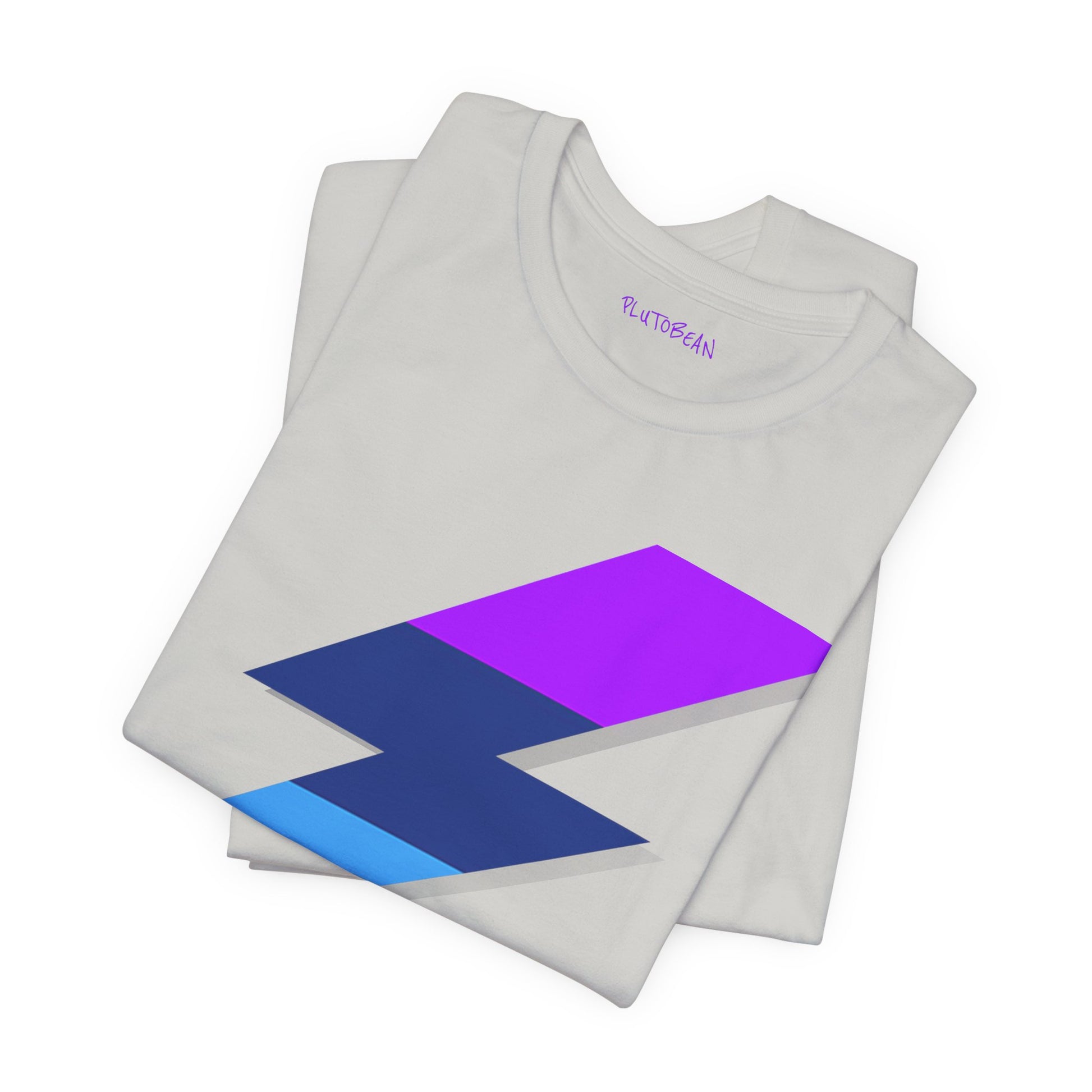 Folded silver tee with vivid lightning bolt design in electric hues
