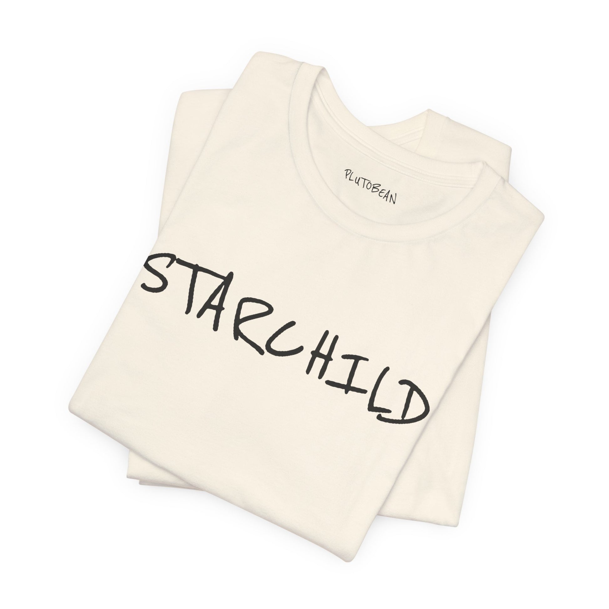 Folded natural tee with bold handwritten “STARCHILD” design in black